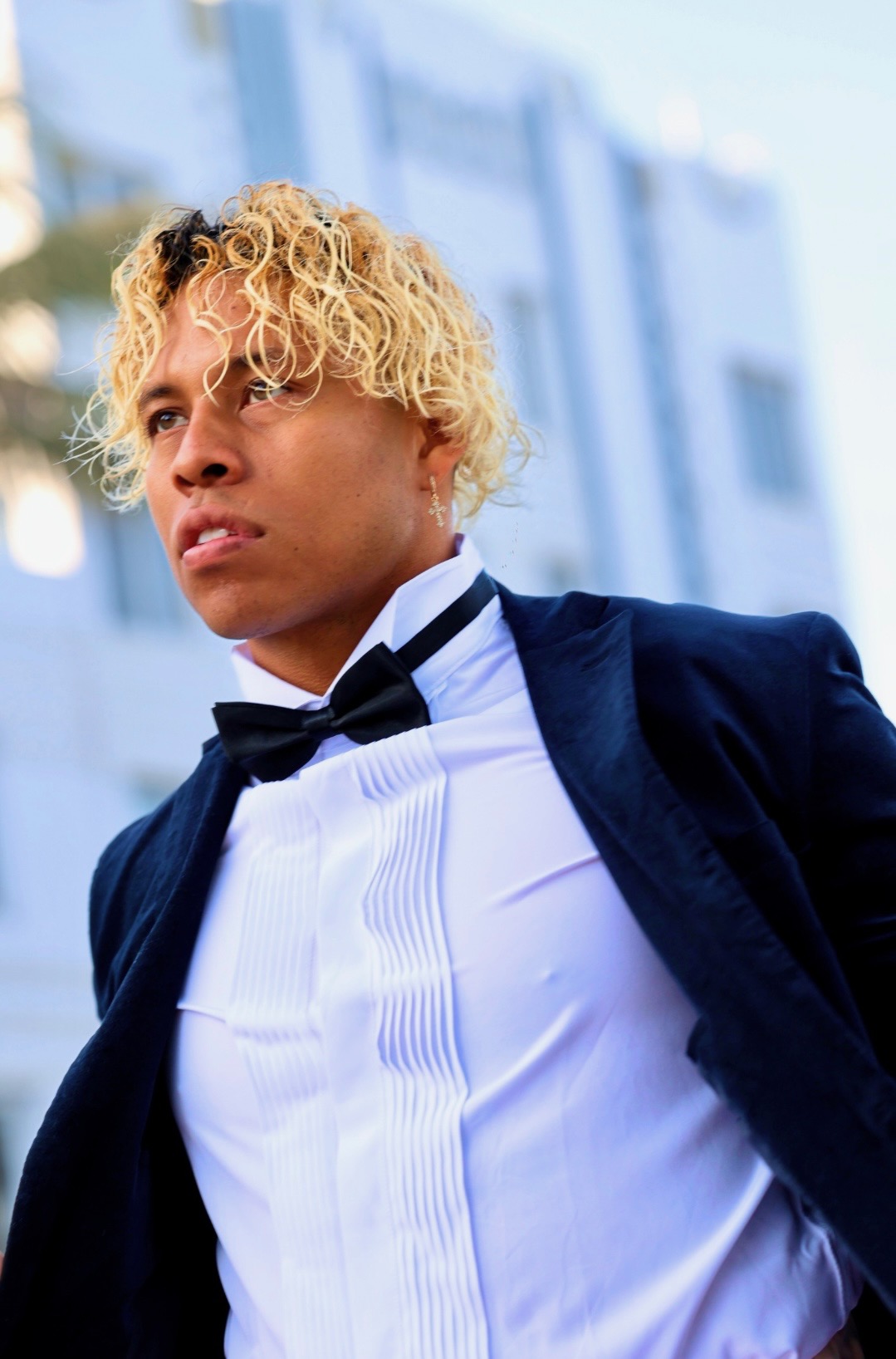 Ziggy Zeigler professional headshot in formal tuxedo